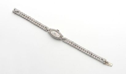 null 64.BRACELET MONTRE de dame en platine (900 millièmes) et or gris (750 millièmes)...