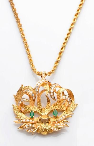 null HERMES 

PENDENTIF "lion" en or jaune (750millièmes) ajouré serti de diamants...