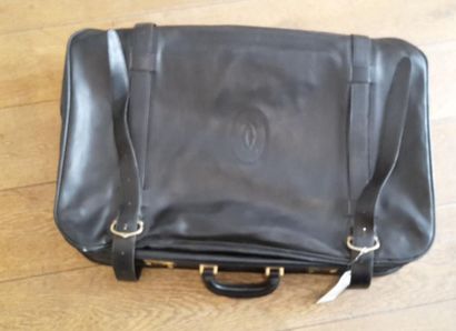 null CARTIER - Must

Valise en cuir noir 
72 x 49 x 15 cm (usures)