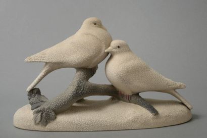 Anonyme

Couple de colombes enlacées sur...