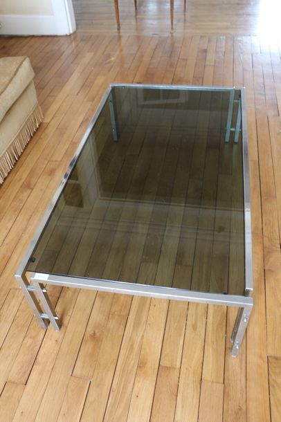  Table basse en métal et verre 
Circa 1970 
30 x 64 x 114 cm