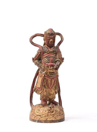 null Gardien en bronze laqué rouge et or.

Chine, période Ming, 

22 cm