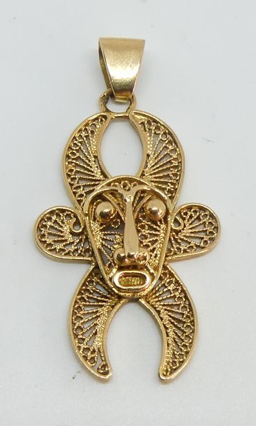 null PENDENTIF en or jaune filigrané figurant un masque africain. Poids 6,26 g