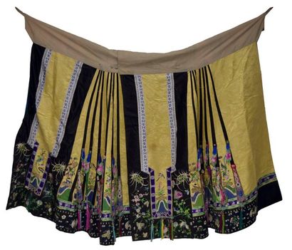 null Embroidered silk skirt with ploychrome patterns of birds and flowers on a yellow...