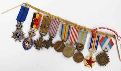 null ORDERS AND DECORATIONS. Chain of nine medals in reduction. Order of Leopold...