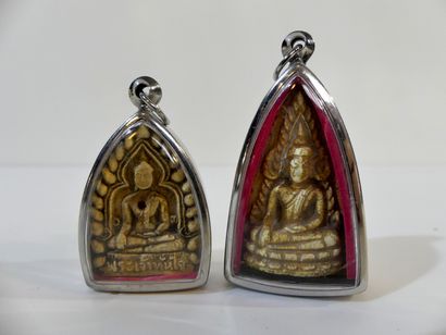 null Set of two amulets: First amulet representing Buddha Phra Jao Than Jai in a...