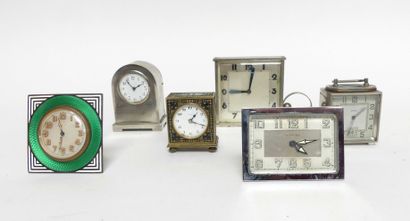 null Six alarm clocks, one of which is square, decorated with white and black champlevé...