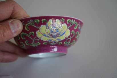 null 
BOWL in polychrome enameled porcelain with three yellow peonies in their foliage...