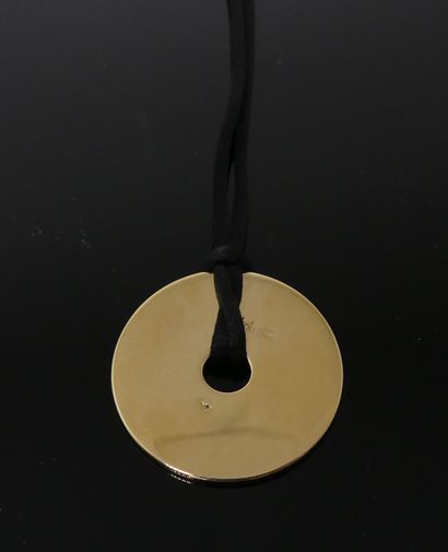 null DINH VAN PENDANT "Pi" in plain yellow gold on one side, and black enamel on...