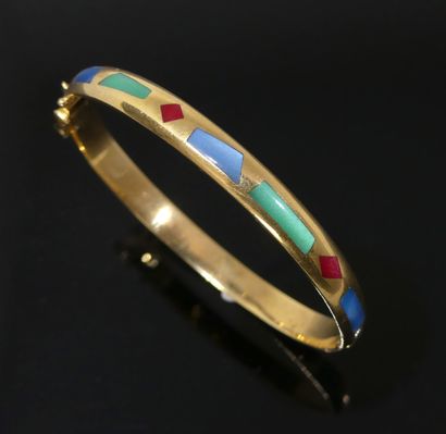null Rigid opening BRACELET in yellow gold and mother-of-pearl inlay. Gross weight...