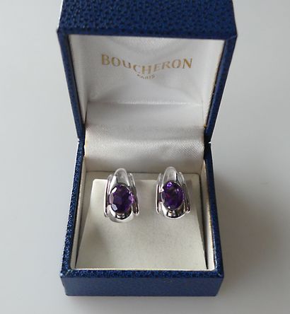 null 
BOUCHERON. Pair of white gold ear CLIPS set with faceted oval amethysts. Signed...