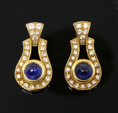 Pair of yellow gold earrings set with diamonds...