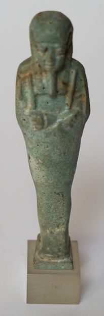 EGYPT, Ptolemaic period. OUSHEBTI in turquoise...
