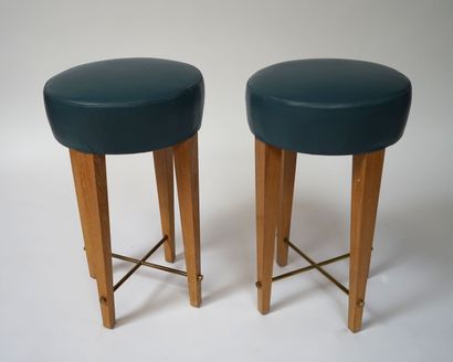 null Pair of bar TABOURETS in ceruse oak, the seat in duck blue leather, the X-shaped...