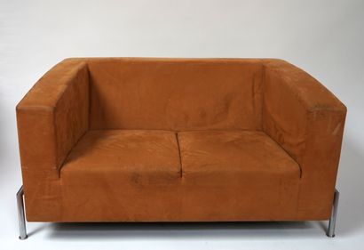 null Contemporary school. Two seater sofa, in fawn-coloured leather, the base in...