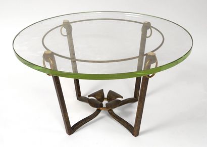 ANONYMOUS, circa 1950. Low table in wrought...