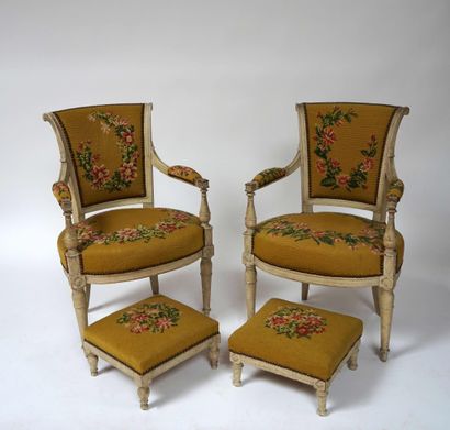 Pair of cabriolet armchairs with reversed back, in moulded and carved wood, grey...