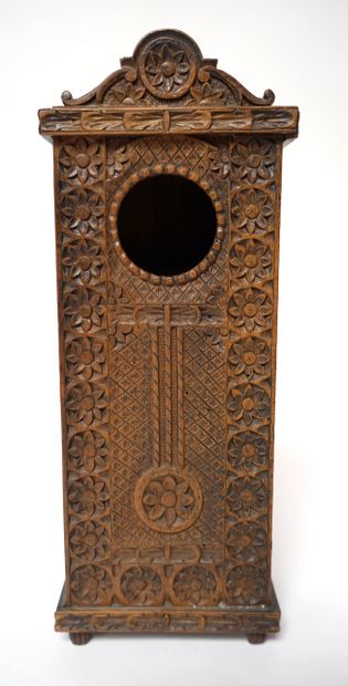 A carved wooden MASSAGE HOLDER, the front...