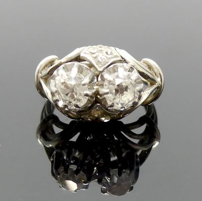 White gold ring set with two old-cut diamonds,...