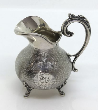 null 
MILK POT in silver guilloche, the body decorated with an oval cartouche with...