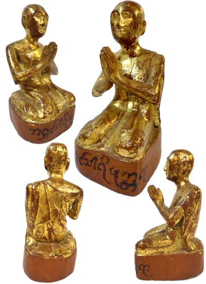 null Kneeling worshipper with hands joined in prayer, on a rectangular base, in lacquered...