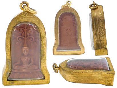 null Terracotta amulet representing Buddha seated in the position of taking the Earth...