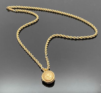 NECKLACE in yellow gold 750 mils, and MEDAILLON...