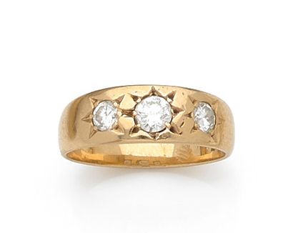 Yellow gold ring set with three star-set...