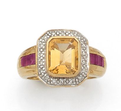 null Yellow gold ring, the rectangular bezel set with a citrine in a setting of small...
