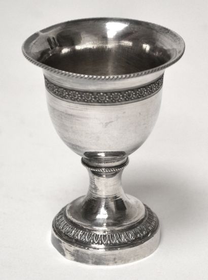 null Silver COQUETIER, the foot decorated with laurel leaves, the neck girdled with...