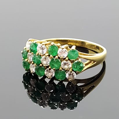 null Yellow gold ring with a "checkerboard" bezel set with diamonds and emeralds...