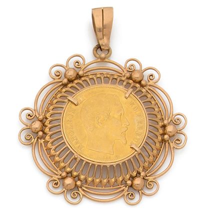 null PIECE of 20 francs gold Napoleon III mounted in pendant, the setting in gold...