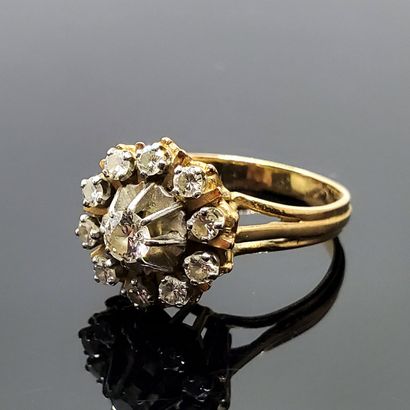 Yellow gold and platinum daisy ring set with...