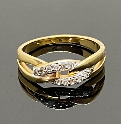 null RING in yellow gold 750 mils, the mounting added of links, the central one set...