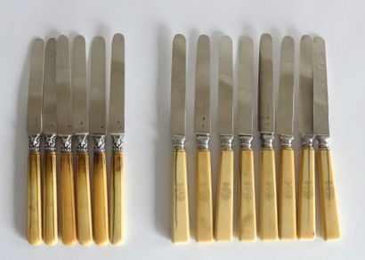  Eight FRUIT KNIVES in silver 925 millimes and ivoirine, the handle armorie. Six...