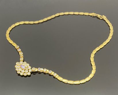 NECKLACE in yellow gold 750mil, the central...