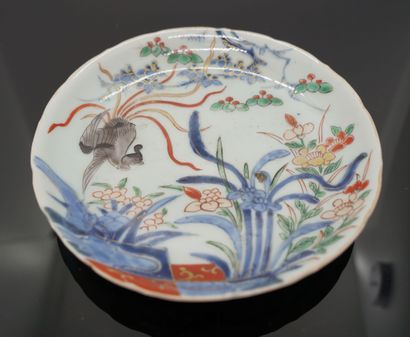 null CHINA or JAPAN. Small porcelain plate with Imari decoration of a bird of paradise,...