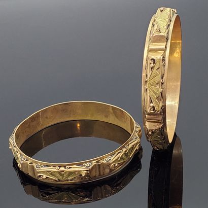 Pair of rigid BRACELETS in two 750 mils gold,...