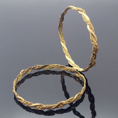 Two rigid BRACELETS in yellow gold 750 mil....