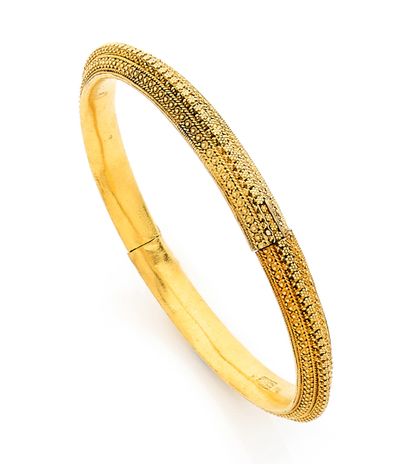 null Beautiful rigid BRACELET in yellow gold 750 mil. with median opening, very finely...