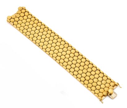 null Beautiful, wide BRACELET cuff in brushed, honeycomb-weave 750-mil. yellow gold....