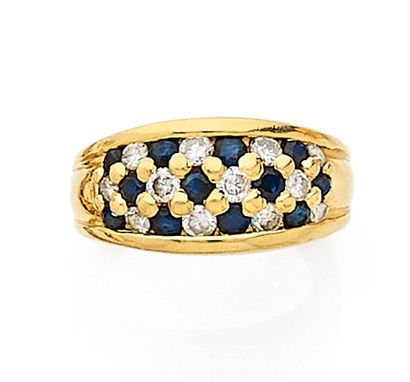 null Ring in yellow gold 750 mils set with sapphires and diamonds in a checkerboard...