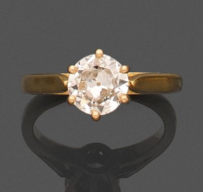 RING in yellow gold 750 mils set with a solitaire...