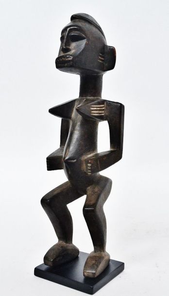 null Statuette féminine ? Sénoufo ? Côte d'ivoire Bois dur à patine d'usage mate...