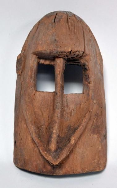 null vieux masque Dogon bois dur très érodé (Mali), 27 cm