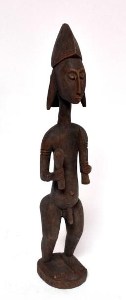 null statue de guerrier Sénoufo portant un sabre et une massue(RCI), 53 cm