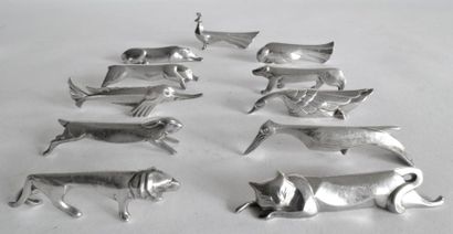 null GALLIA et SANDOZ. Série de onze PORTE COUTEAUX en métal argenté, en forme d'animaux,...