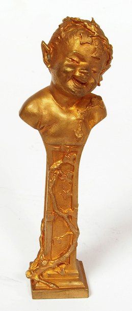 Ch. LOUCHET (XIXe-XXe) Buste de jeune satyre riant Sujet en bronze signé au dos...