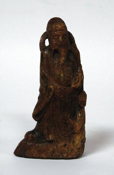 CHINE, XVIII-XIXe Sage et enfant en corne sculptée.H. 14 cm