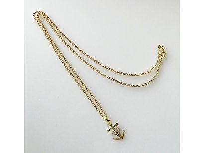 null CHAINE en or jaune maille forçat et PENDENTIF ancre de marine. Poids 8,7 g